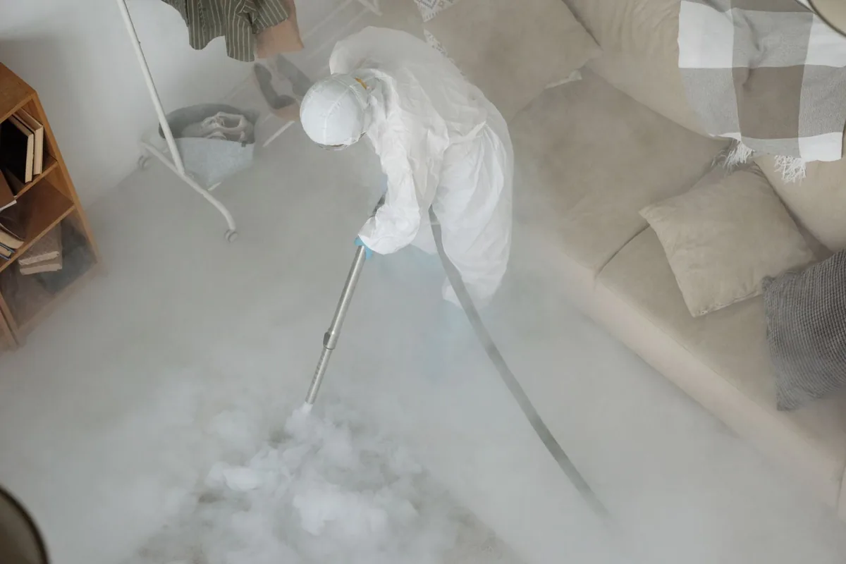 Biohazard cleanup technician in protective equipment, Oak Valley, NJ